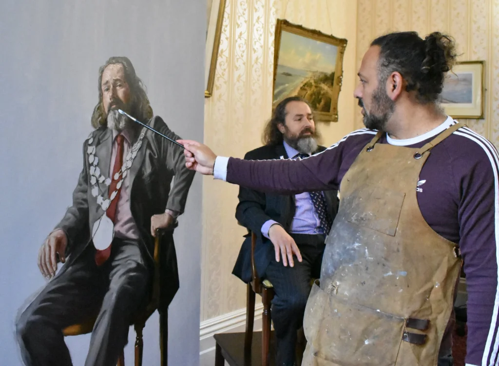 Image of portrait artist based in Bournemouth painting the old Mayor of Bournemouth George Farquhar 